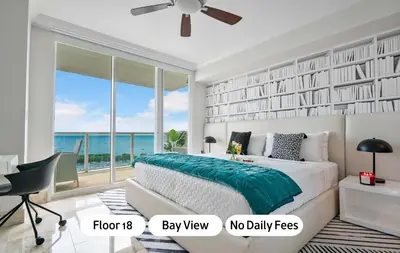 a bedroom with a bed with a view of the ocean at MVR-Coconut Grove-s Best Kept Secret-Revealed in Miami