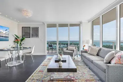 a living room with a couch and a table at MVR - Elevate Your Stay with Panoramic Bay Views in Miami