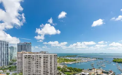 a view of a harbor with boats in the water at MVR - Wake to Sunrises Toast to Sunsets in Miami
