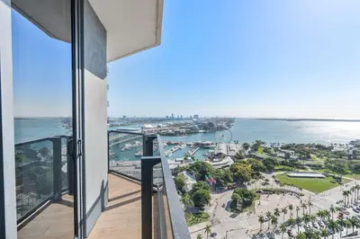 a view of the ocean from the balcony of a building at MVR - Sunset & Skyline Magic from Your Balcony in Miami