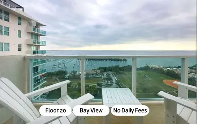 a balcony with chairs and a view of the ocean at MVR - Act Fast-Grove-s Best Stays Don-t Last in Miami