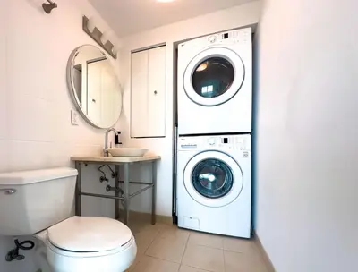 a bathroom with a washer and dryer at MVR - Act Fast-Grove-s Best Stays Don-t Last in Miami