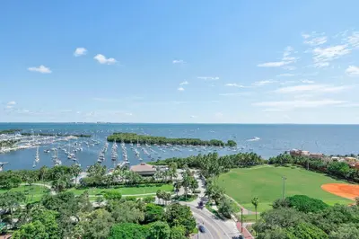 an aerial view of a marina with boats at MVR - Skyline Dreams from Your Private Balcony in Miami