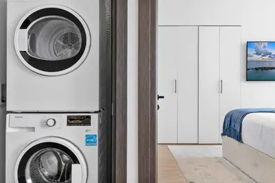 a washer and dryer in a room at MVR - Swim Relax & Enjoy Jaw-Dropping Views in Miami