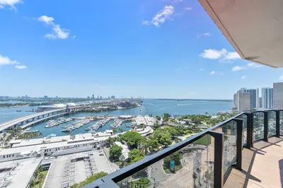 a view of a harbor from a balcony at MVR - Designer Apt with Jaw-Dropping Views & Pool in Miami