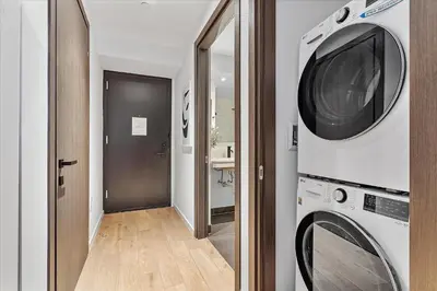 a laundry room with a washer and a dryer at MVR - Only for VIP Travelers - Luxe Stay in Downtown in Miami