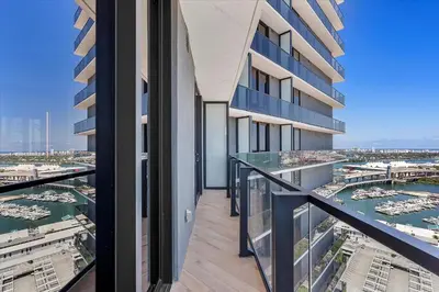 an apartment balcony with a view of a harbor at MVR - Best Views in Downtown - Walk Everywhere in Miami