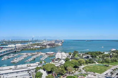an aerial view of a marina with boats in the water at MVR - Best Views in Downtown - Walk Everywhere in Miami
