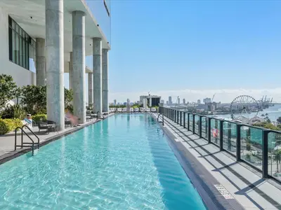 a swimming pool on top of a building with a view of the city at MVR - 5-Star Downtown Stay Near Miami-s Hotspots in Miami