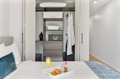 a bedroom with a bed with a tray of bread at MVR - SupErhost Stay 10 Yrs of 5-Star Service in Miami