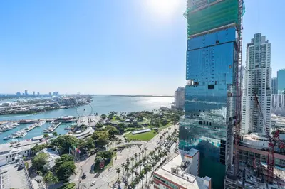 a view of a city with a river and buildings at MVR - SupErhost Stay 10 Yrs of 5-Star Service in Miami