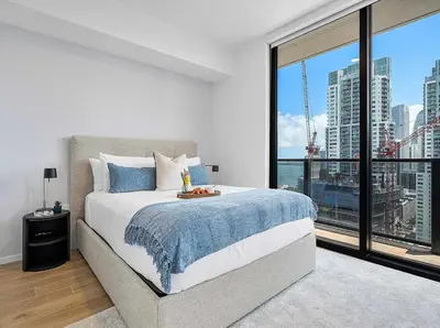 a bedroom with a bed and a large window at MVR - Wake Up to Miami-s Most Iconic Views in Miami