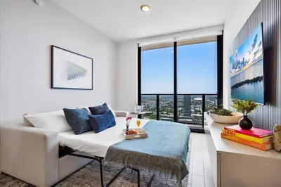 a living room with a couch and a table at MVR - Last-Minute Deal Luxe Stay in Downtown in Miami