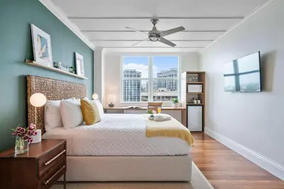 a bedroom with a large bed and a window at MVR Suite with Picture-Perfect Views of Miami in Miami