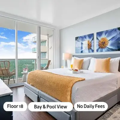 MVR Suite with Poolside Sips and Biscayne Backdrop