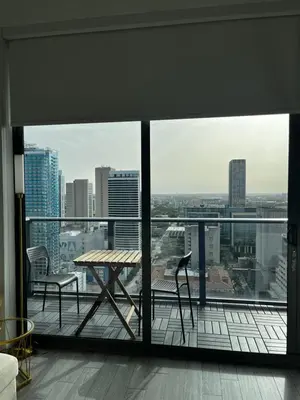 a balcony with a table and a view of a city at Luxury Studio in Miami