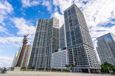 a group of tall skyscrapers in a city at Icon Brickell 2BR Poolside Paradise in the Sky in Miami