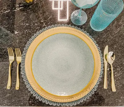 a table with a plate and cutlery on it at Miami apartment style - Casino & Restaurants in Fort Lauderdale