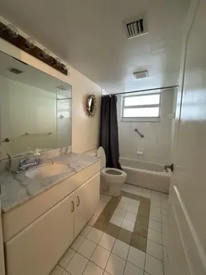 a bathroom with a sink and a toilet and a shower at Bright 2BR Apartment in Prime Brickell Location in Miami