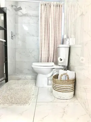 a white bathroom with a toilet and a shower at Retreat Independent Entire Room in Princeton