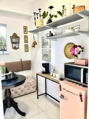 a kitchen with a refrigerator and a table at Retreat Independent Entire Room in Princeton