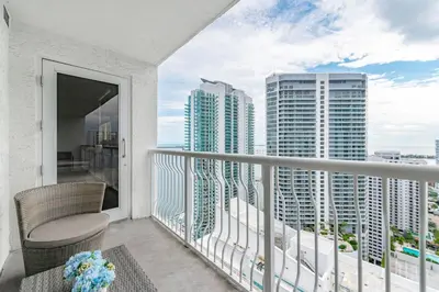 a balcony with a view of the city at 3 bedroom stunning apt brickell in Miami