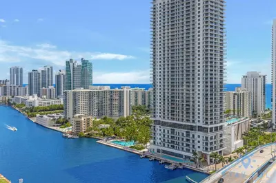 an aerial view of a city with tall buildings at Infinite Views - Private Balcony -Poolside Bliss Near the Beach in Hallandale Beach