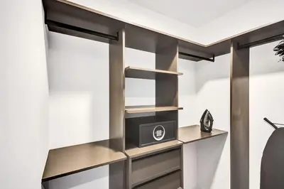 a room with a desk with a microwave in it at Lux Miami Studio City Bay Views in Miami