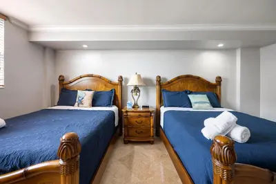 two beds sitting next to each other in a bedroom at Entire Condominium in Sunny Isles in Sunny Isles Beach