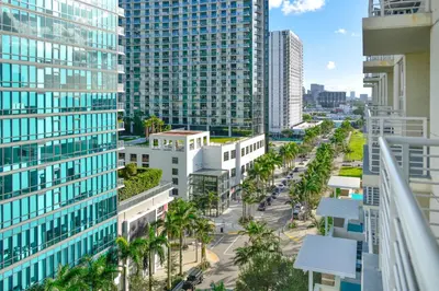 an aerial view of a city with tall buildings at Miami Midblock Condo - City Views, Pool & Balcony! in Miami