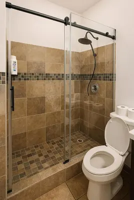 a bathroom with a shower with a toilet at Tempurpedic Queen - Laundry, Parking & EV Charger in Hollywood