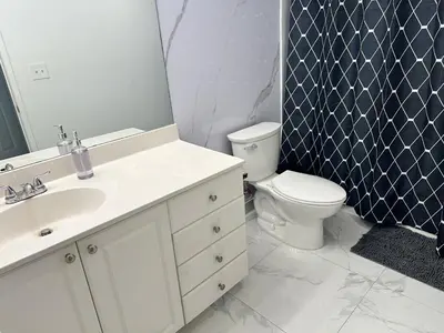 a bathroom with a sink and a toilet and a shower at Beatiful apartment 2nd Floor - SRT 3143 in Sunny Isles Beach