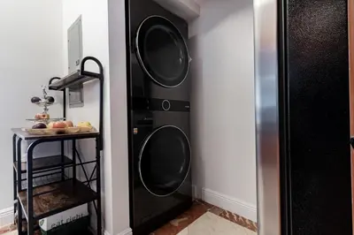 a black washer and dryer in a room at Pierfront Escape in Sunny Isles Beach