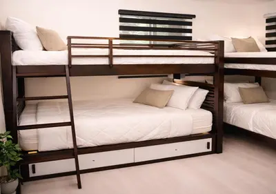 a room with three bunk beds in a room at Casa Hard Rock Stadium in Miami Gardens