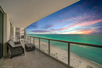 a balcony with a view of the ocean at Balcony on the Ocean - Picture Perfect in Sunny Isles Beach