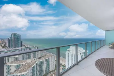 a balcony with a view of the ocean at Luxury Living on the Beach with Resort Amenities in Hollywood