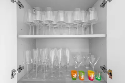 a bunch of wine glasses sitting on shelves at Luxury Penthouse 4 BDR with Resort Amenities in Hollywood
