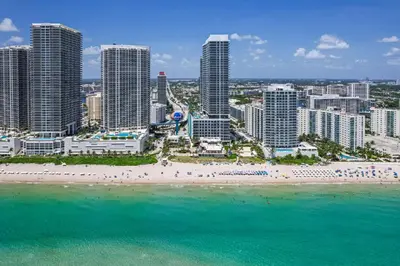 an aerial view of a beach in front of a city at Luxury Penthouse 4 BDR with Resort Amenities in Hollywood