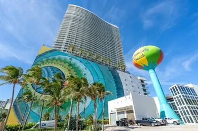 a large building with a mermaid on the side of it at Sunny Balcony - Beautiful Stay for 2 with Ocean Views & Resort Amenities in Hollywood