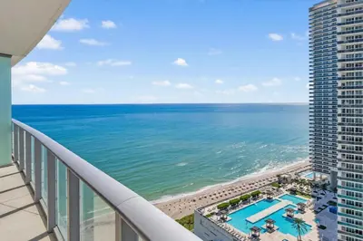 a view of the ocean from the balcony of a building at Cosy 1 Bedroom Breathtaking Ocean Views at LYFE Resort in Hollywood