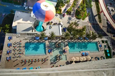 an overhead view of a pool at a resort at Cosy 1 Bedroom Breathtaking Ocean Views at LYFE Resort in Hollywood