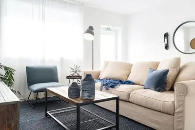 a living room with a couch and a table at Instant Stay Ocean Drive in Miami Beach