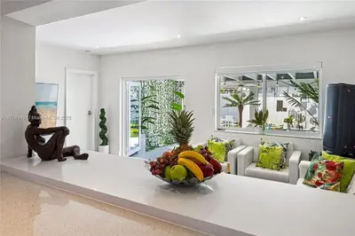 a bowl of fruit on a table in a living room at Bayside Bliss on Marseille in Miami Beach