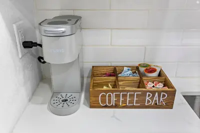 a box of coffeeaband sitting on a counter in a bathroom at Walk To Coral Gables | SLEEP 8| Free BEACH Package in Miami