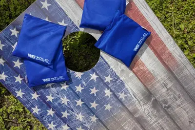 a quilt with american stars and stripes on a table at Walk To Coral Gables | SLEEP 8| Free BEACH Package in Miami