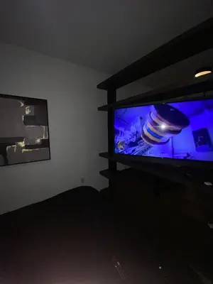 a living room with a flat screen tv in a room at Comfortable apartment in Downtown Miami in Miami