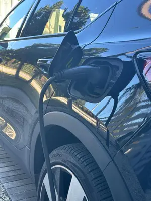 a close up of a car being charged at Modern Haven in Paradise w Heated Eco Pool 5B 4B in Miami