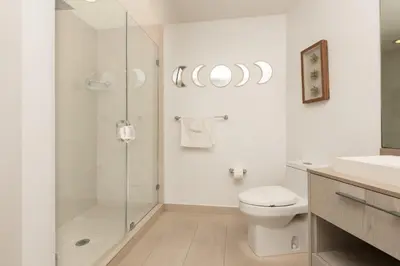 a bathroom with a shower and a toilet and a sink at Relaxing Beach Escape with Scenic Views in Hollywood