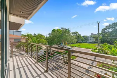a balcony with a view of a street at Jungle Serene Lux Home with Pool Sauna Ice Bath in Fort Lauderdale