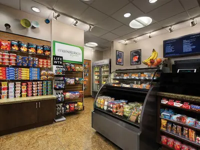 a grocery store aisle with food and drinks on display at Marriott's BeachPlace Towers 2BR Apartment with Resort Access in Fort Lauderdale